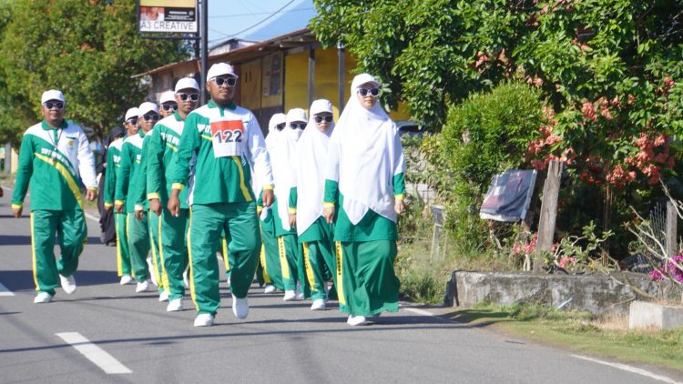 Peringatan HUT ke-79 ,PGRI Kota Tidore Gelar Gerak Jalan Kesegaran